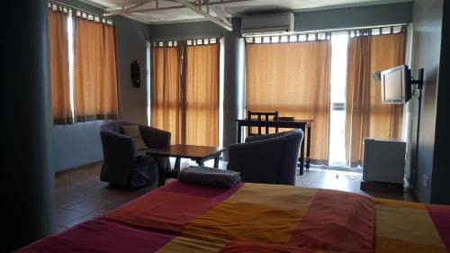 Oyster Bay Cama Y Desayuno | Q-Bar & Guesthouse