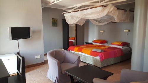 Oyster Bay Cama Y Desayuno | Q-Bar & Guesthouse