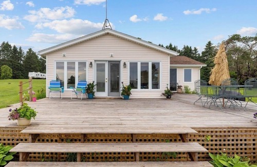 Rice Point Cabaña | Quaint Cottage with direct beach access and water views that go on for miles.