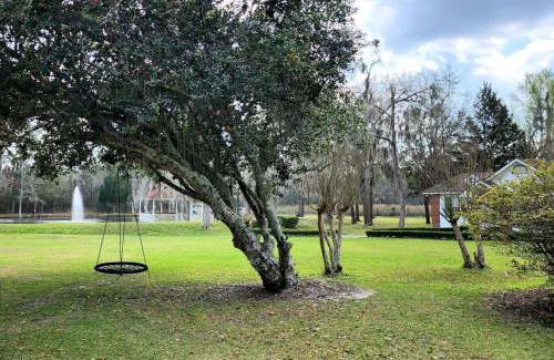 Midway Casa | Quaint Cottage with Covered Dock on the Pond and Walking Trails in Georgia