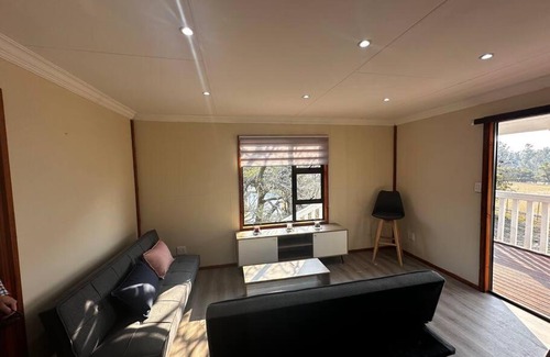 Lanseria Apartamento | Quaint Log Cabin