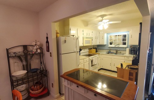 Carolina Shores Villa | Quaint Villa backing onto a golf course with view of water..