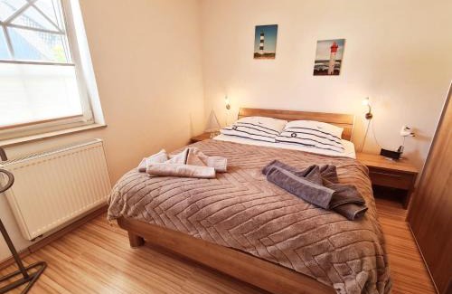 Zingst Apartamento | Quartier4u - 4 Sterne - inklusive eigene BikeBox mit Strom - Wäschepaket - POWER WLAN - Parkplatz - early CheckIn - # Bestpreisgarantie #