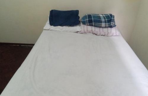 Nazareth Casa | Quarto com vista pra Piscina