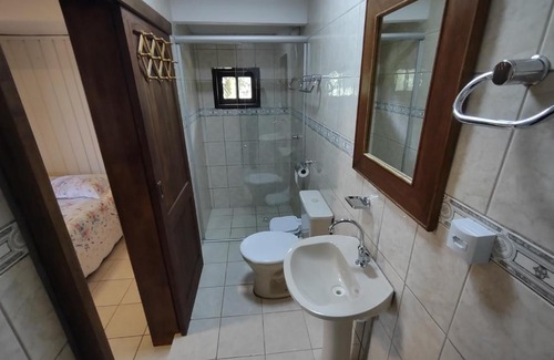 Praia Grande Apartamento | Quarto Ipê Rosa