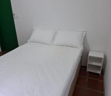 Armacao Casa | Quarto na Praia da Armação