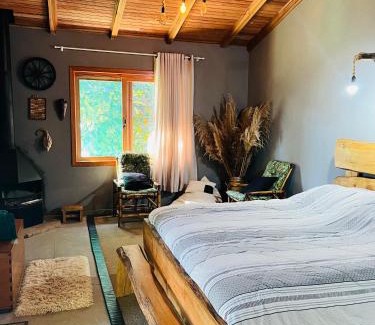 Uniao da Vitoria Casa | Quarto/suíte com lareira
