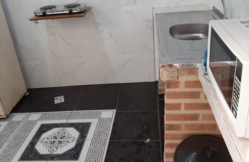 Gavea Casa | Quarto Suite e Cozinha na Gavea