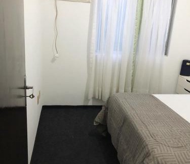 Centro Casa | Quartos a 50 metros da praia