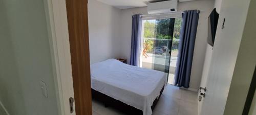 Ribeirao da Ilha Apartamento | Quartos Confortáveis em casa compartilhada - 5 min Aeroporto Internacional