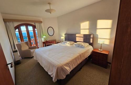 Vila Poran Apartamento | Quatre 410 · Q410 - Lareira , piscina e sossego na montanha