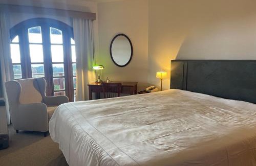 Vila Poran Apartamento | Quatre 410 · Q410 - Lareira , piscina e sossego na montanha