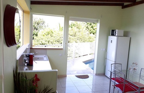 Riviere-Salee Apartamento | Apartamento tranquilo y cálido con piscina privada.
