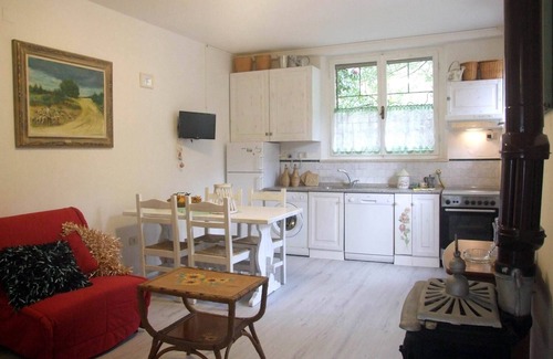 Val Canina Apartamento | Tranquilo apartamento en planta baja con jardín y terraza.