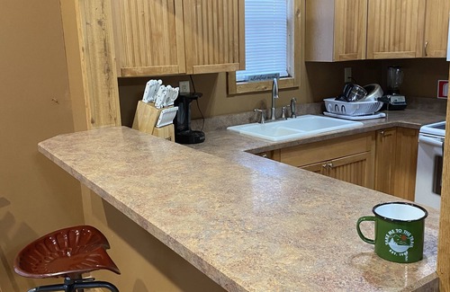 Bee Branch Casa | Quiet cabin in the woods with hiking trails, fishing ponds, paddle boats, canoes