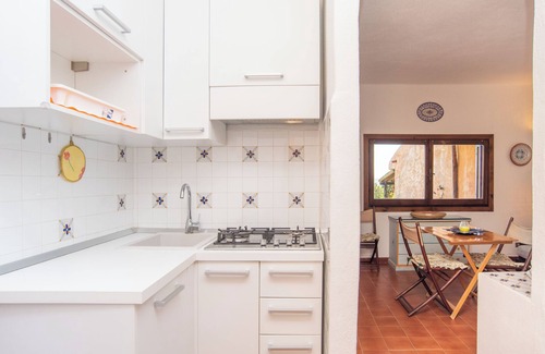 Punta Sardegna Apartamento | Quiet Holiday Apartment with Terrace with Sea View; Parking Available; Pets Allowed
