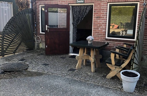 Noordwelle Apartamento | Quietly located apartment in Noordwelle, close to Renesse