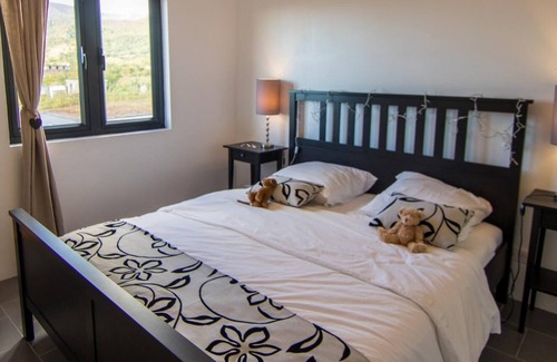 La Gaulette Apartamento | Hibiscus-Apartamento-Confortable-Baño con bañera-Vista a la laguna