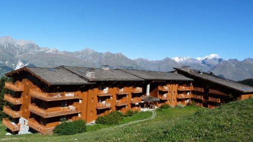 Arc-1800 Apartamento | Résidence Saint Bernard - Appartement de charme pour 6 personnes, dans une résidence skis aux pieds avec accès piscine et parking privé dans le village du MAE-8971