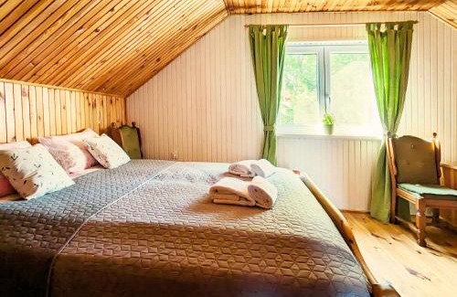 gmina Stary Dzierzgon Casa | Różany Ogród - dom pod lasem, z widokiem na jezioro i kominkiem, rowery, łódka, rowerek wodny