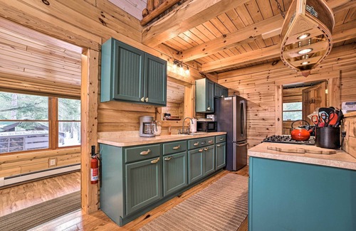 Irons Cabina | 'Rainbow Lodge' at Scenic Double J River Camp