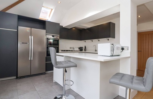 Rowton Casa | RAINBOWS END, with a garden in Christleton