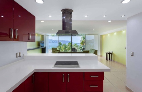 Hornos Hotel | Ramada by Wyndham Acapulco Hotel & Suites