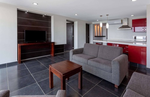 Hornos Hotel | Ramada by Wyndham Acapulco Hotel & Suites