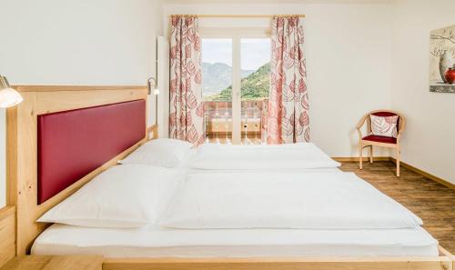 Lagundo Apartamento | Rasnerhof Ferienwohnung Talblick