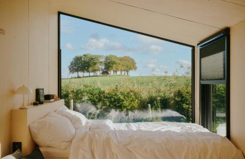 Konigslutter am Elm Cabina | Raus Tiny House auf dem Land mit Hoftieren und Sauna