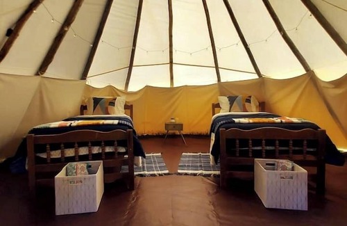 Saddlestring Casa | Raven Tipi, Rustic "Raven" Tipi by Bighorn Mountains