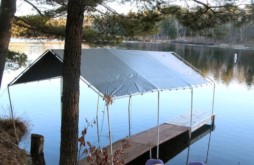 Solon Springs Cabina | Cabaña de madera real en la cadena de Eau Claire Lakes cerca de Hayward, WI