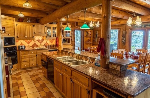 Land O Lakes Casa | Redstone, a one-of-a-kind, luxurious 7200 sq. ft. impressive Lakeside log home