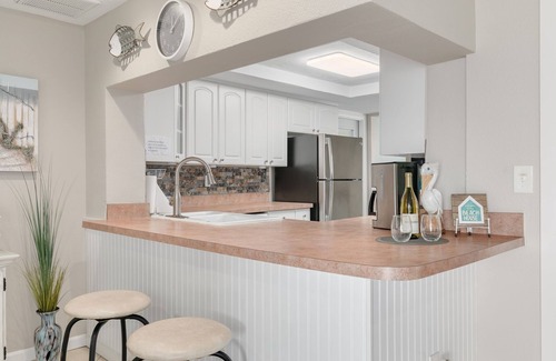 Flor-a-mar Casa | Nuevo en VRBO Barco pontón gratis, piscina climatizada, bicicletas, kayaks y WIFI.