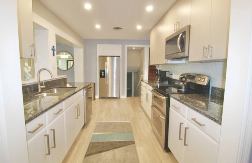 Stuart Casa | Reduced Rates! 4BR/3BA Home - Heated Pool - - Close to Beach and Historic Downtown Stuart!