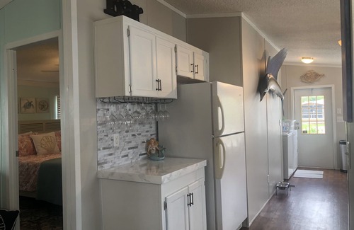 Indian Harbor Estates Casa | Reel Paradise Cottage- Canal Front- Bring your Boat to our 50’ Dock!