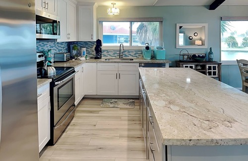 Jamaica Beach Casa | Reel Paradise | Pet Friendly, Waterfront, Pool!