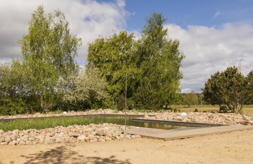 Krienke Casa | Reetdachhaus mit Schwimmteich in Krienke