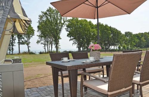 Lobbe Villa | Reethus am Strand - Haushälfte 1 mit Kamin, Sauna