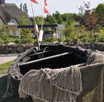 Lobbe Villa | Reethus am Strand - Haushälfte 1 mit Kamin, Sauna