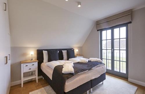 Kreptitz Casa | Reetland am Meer - Luxus Reetdachvilla mit 3 Schlafzimmern, Sauna und Kamin E17