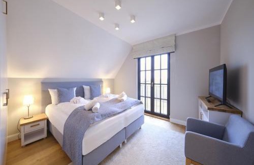 Dranske Casa | Reetland am Meer - LuxusPlus Reetdachvilla mit 4 Schlafzimmern und Kamin G09
