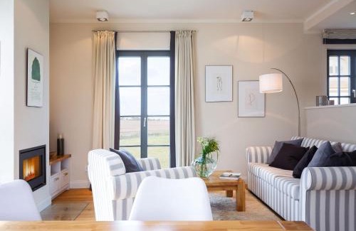 Kreptitz Casa | Reetland am Meer - Premium Reetdachvilla mit 2 Schlafzimmern, Sauna und Kamin E04