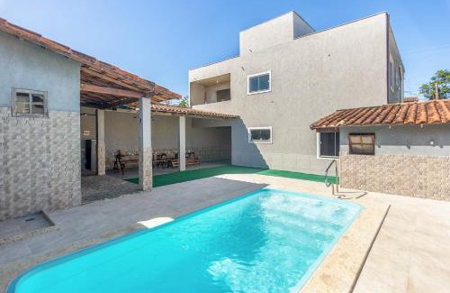 Cabo Frio Casa | Refúgio Tropical Casa de Praia com Piscina Climatizada e 4 Suítes e garagem 3 carros, 800 mtrs da praia internet 700 mbps, condomínio privado com pista de skate , quadra de futevôlei , campos e quadras de futebol!