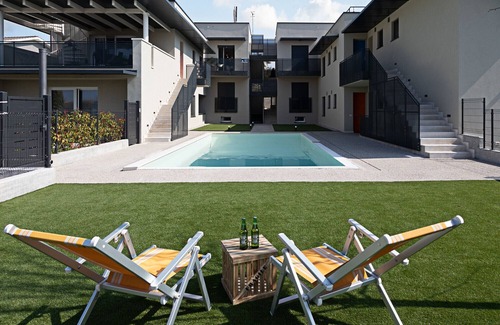 Montioni Apartamento | Regarda - "Zoe" appartment with pool and large lake-view terrace