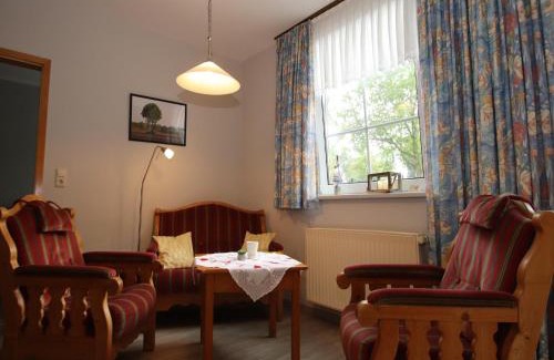 Strackholt Apartamento | Reihenhaus in Strackholt mit beheiztem Pool