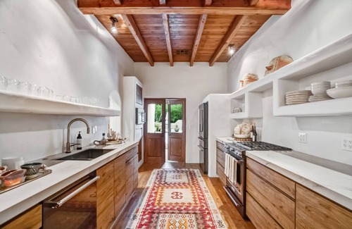 Magnesia Falls Cove Casa | Rejuvenating retreat with pool, artistic finishes, & mtn views - dog-friendly