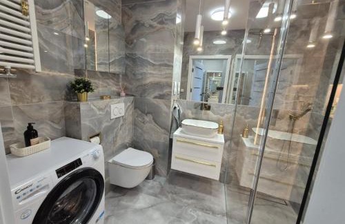 Ploty Apartamento | REKO apartament z basenem i SPA tuż przy plaży