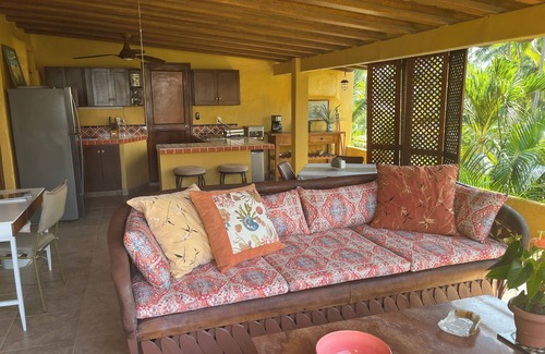 Díaz Ordaz Condominio | Oceanfront 1-bedroom condo amidst the palms at Los Tules in Puerto Vallarta