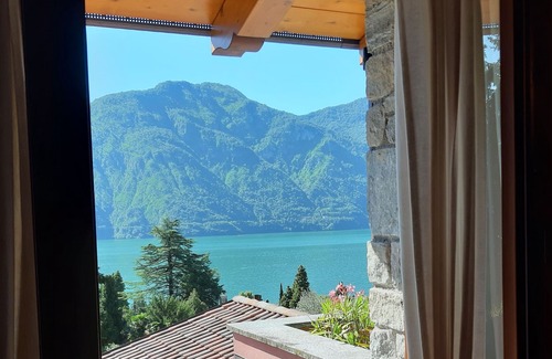 Azzano Casa | Relax and comfort in the apartment in a villa, with a wonderful view of the lake and private pool
